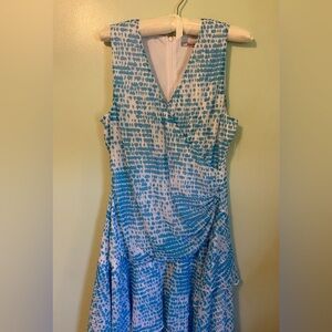 Luxury Carmen Mark Valvo blue and white layered wrap dress.